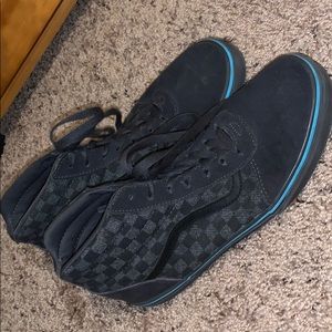 Grey checkered high top vans